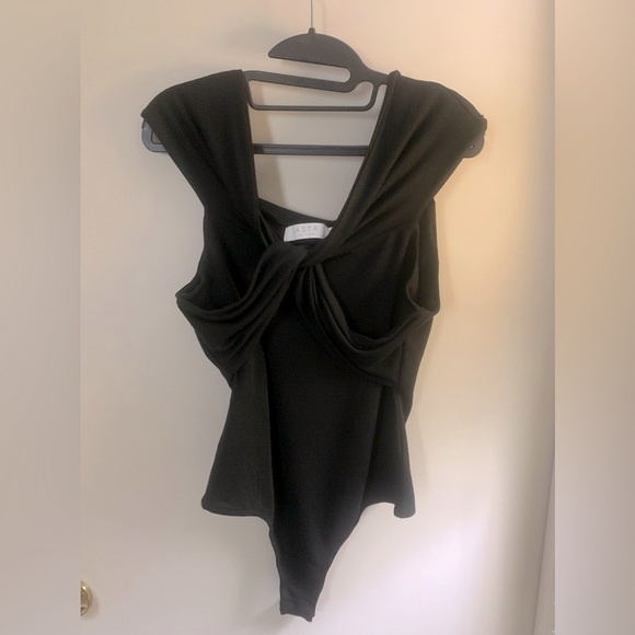 Astr Tops - **Sold**NWT ASTR THE LABEL Black Twist front Bodysuit Sz. Medium
